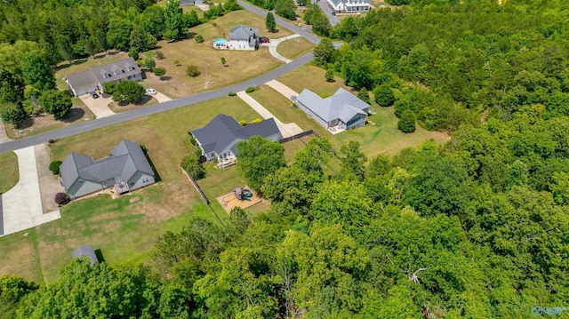 aerial view featuring a view of trees