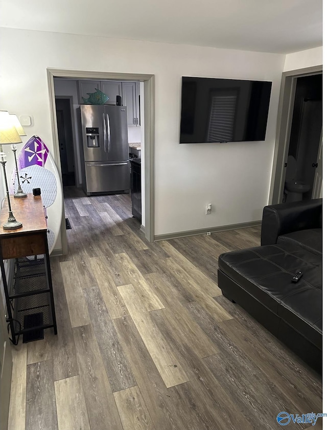 living room featuring dark hardwood / wood-style floors