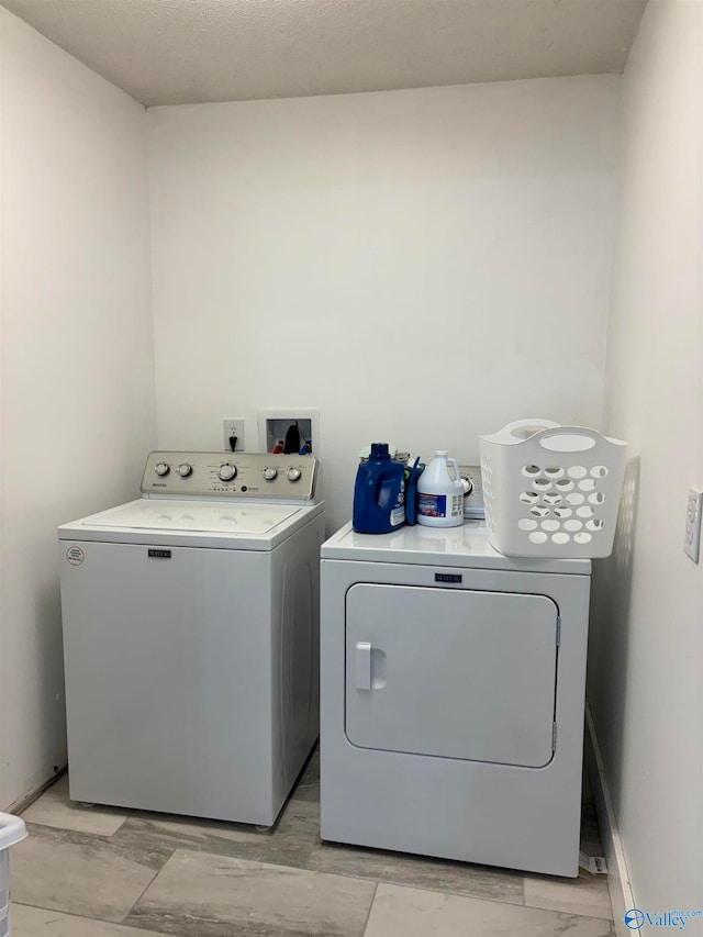 laundry area featuring washer and dryer