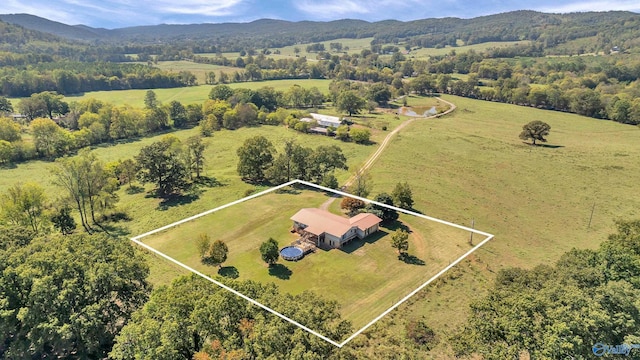 bird's eye view with a rural view and a mountain view