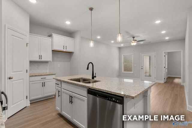 429 Lando Cain Rd, Hartselle, AL 35640 - kitchen with stainless steel dishwasher, a sink, a ceiling fan, light wood finished floors, and recessed lighting
