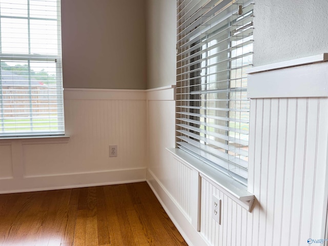 spare room featuring dark hardwood / wood-style flooring