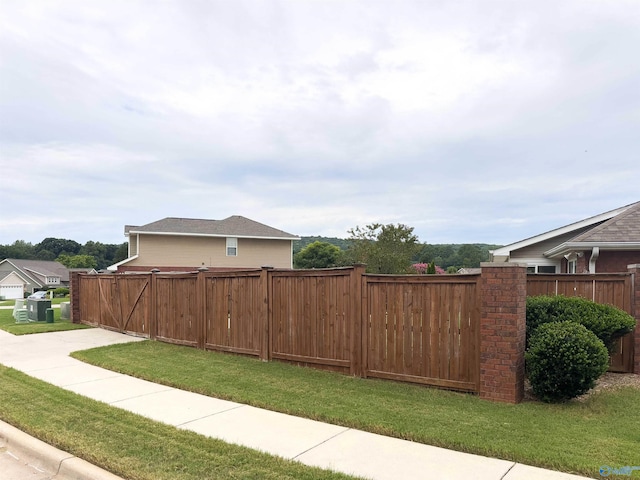 view of side of property featuring a yard