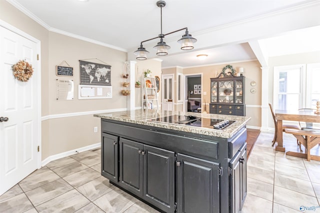 kitchen featuring a kitchen island, black electric stovetop, pendant lighting, and dark cabinets