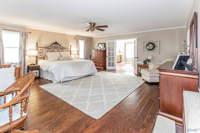 bedroom with a ceiling fan, multiple windows, ornamental molding, and dark wood-style flooring