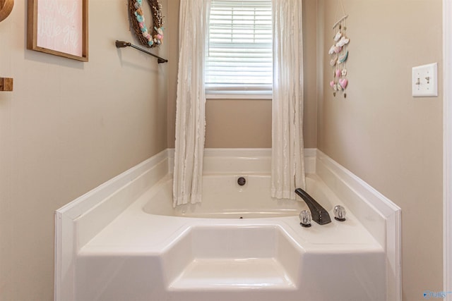 bathroom featuring a bath