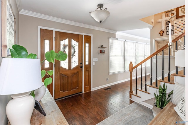 foyer entrance with visible vents, stairs, ornamental molding, and dark wood-style flooring