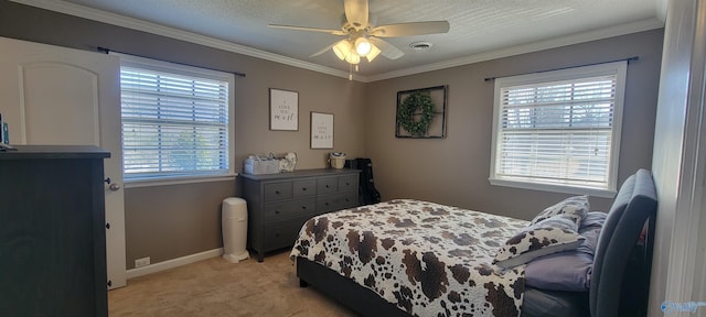 bedroom featuring ornamental molding, visible vents, light carpet, and multiple windows