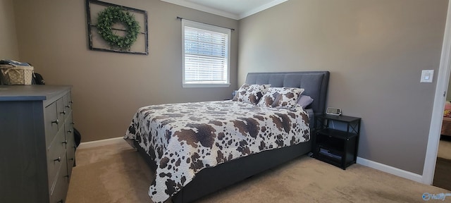 bedroom featuring light carpet, baseboards, and crown molding