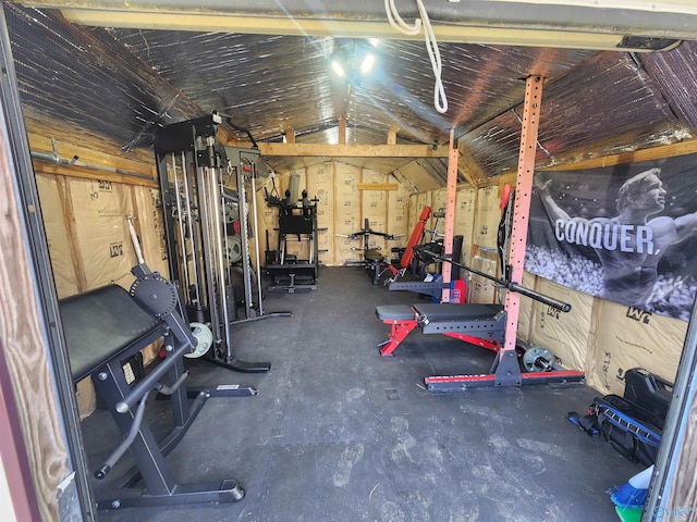 exercise area with vaulted ceiling