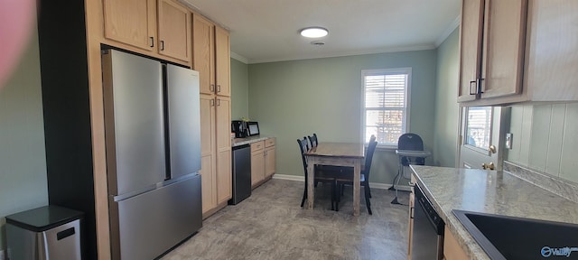 kitchen featuring ornamental molding, dishwashing machine, light brown cabinetry, and freestanding refrigerator