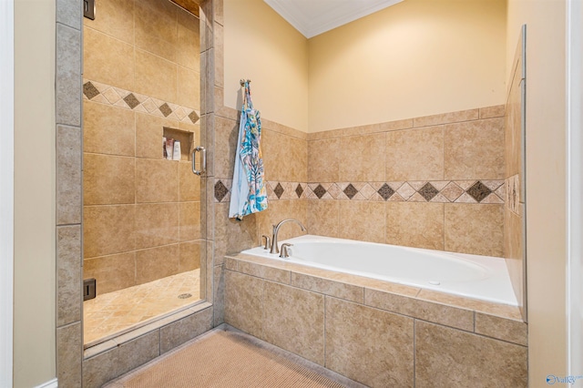 bathroom featuring plus walk in shower and ornamental molding