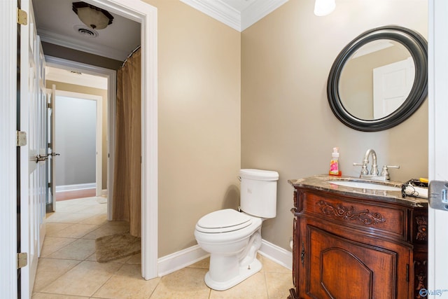 bathroom featuring vanity, crown molding, toilet, and tile patterned flooring