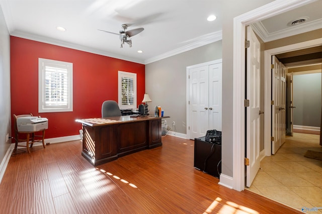 office space featuring crown molding, tile patterned flooring, and ceiling fan