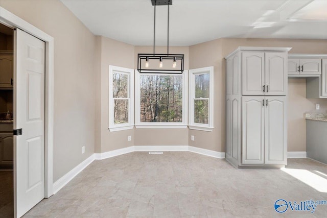 view of unfurnished dining area