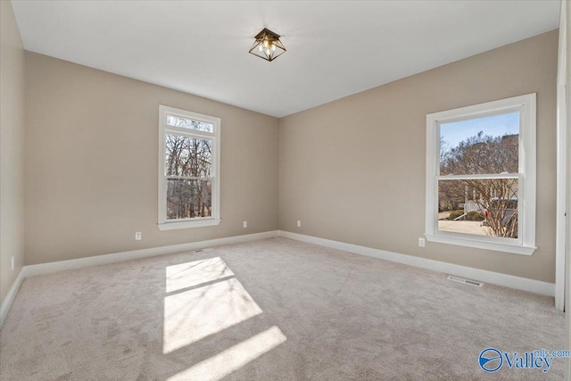 view of carpeted spare room