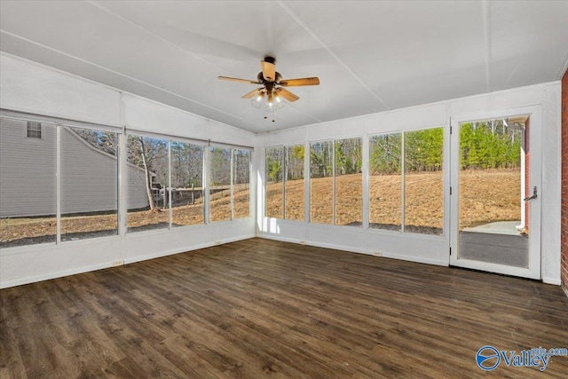 unfurnished sunroom with vaulted ceiling and ceiling fan