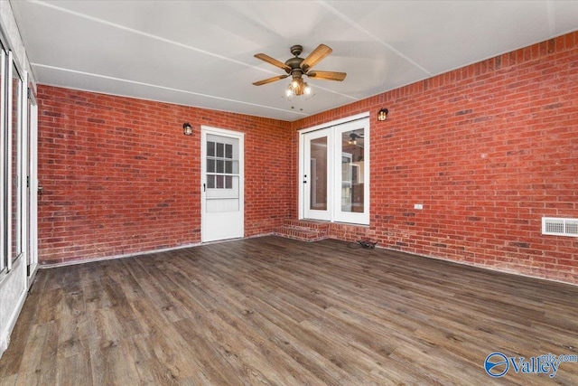 exterior space with french doors and ceiling fan