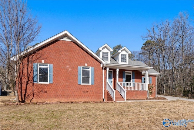 view of front of home featuring a porch and a front yard