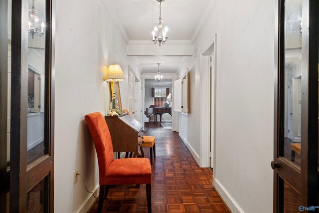 corridor featuring a chandelier, ornamental molding, and dark parquet floors