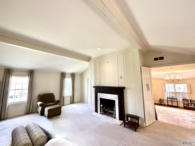 carpeted living room with a chandelier, ornamental molding, lofted ceiling with beams, and a high end fireplace