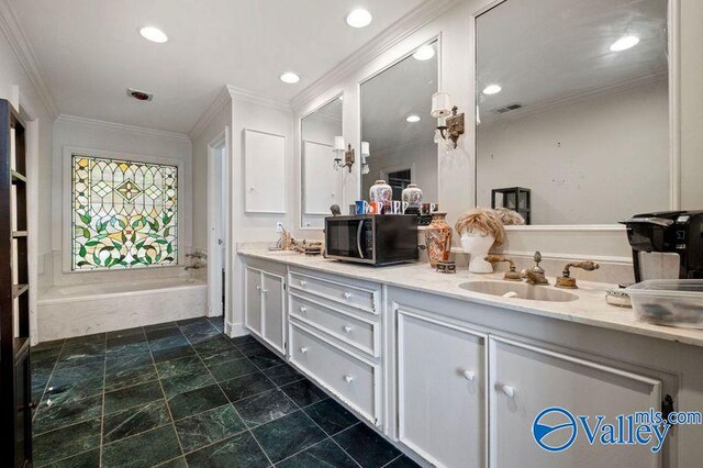 bathroom featuring tile patterned floors, crown molding, and dual bowl vanity