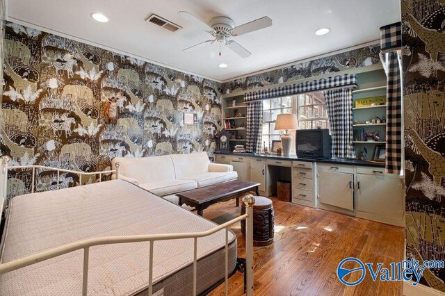 office area featuring hardwood / wood-style flooring and ceiling fan