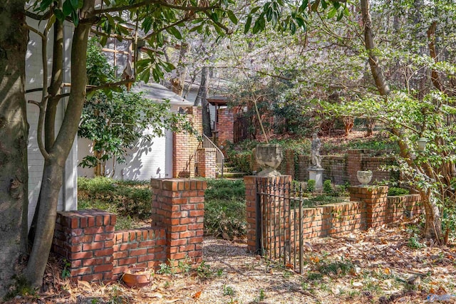 exterior space featuring brick siding