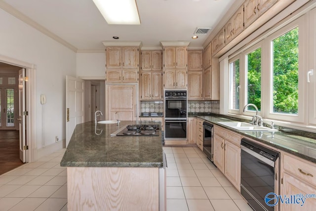 kitchen featuring light brown cabinets, black appliances, a sink, visible vents, and light tile patterned flooring