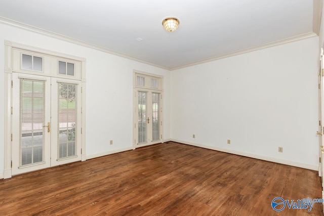 unfurnished room featuring wood finished floors, french doors, a wealth of natural light, and crown molding