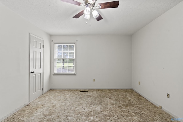 1025 Berkley Rd, Arab, AL 35016 - carpeted empty room with a textured ceiling, a ceiling fan, and baseboards