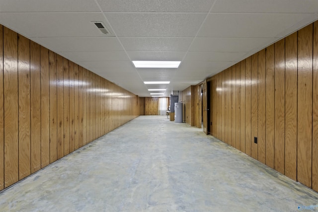 1025 Berkley Rd, Arab, AL 35016 - finished basement featuring wood walls, a drop ceiling, and water heater