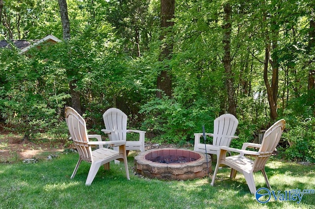 view of yard featuring a fire pit