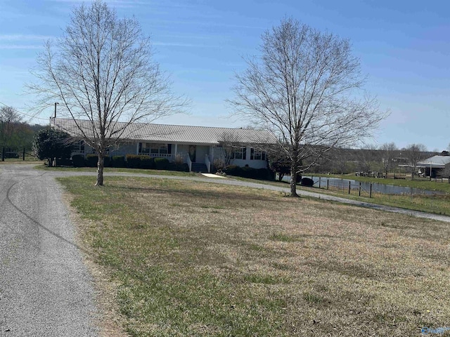2415 Ruth Rd, Arab, AL 35016 - ranch-style house with a front lawn