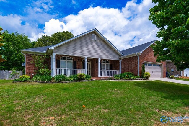 300 Honor Way, Madison, AL 35758 - ranch-style home with covered porch, brick siding, a garage, and driveway
