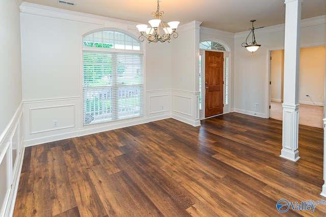 300 Honor Way, Madison, AL 35758 - unfurnished dining area featuring decorative columns, a decorative wall, dark wood finished floors, a wainscoted wall, and ornamental molding