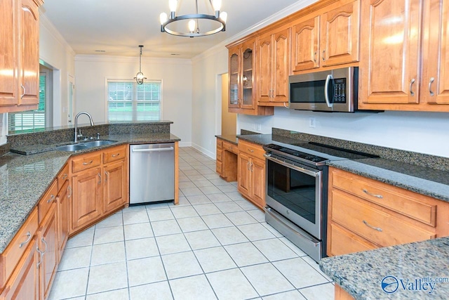 300 Honor Way, Madison, AL 35758 - kitchen with appliances with stainless steel finishes, a sink, ornamental molding, light tile patterned flooring, and dark stone counters