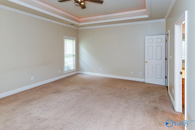 300 Honor Way, Madison, AL 35758 - unfurnished room with crown molding, light carpet, a tray ceiling, a ceiling fan, and baseboards