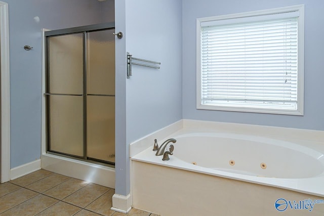 300 Honor Way, Madison, AL 35758 - bathroom featuring a stall shower, a tub with jets, and tile patterned flooring