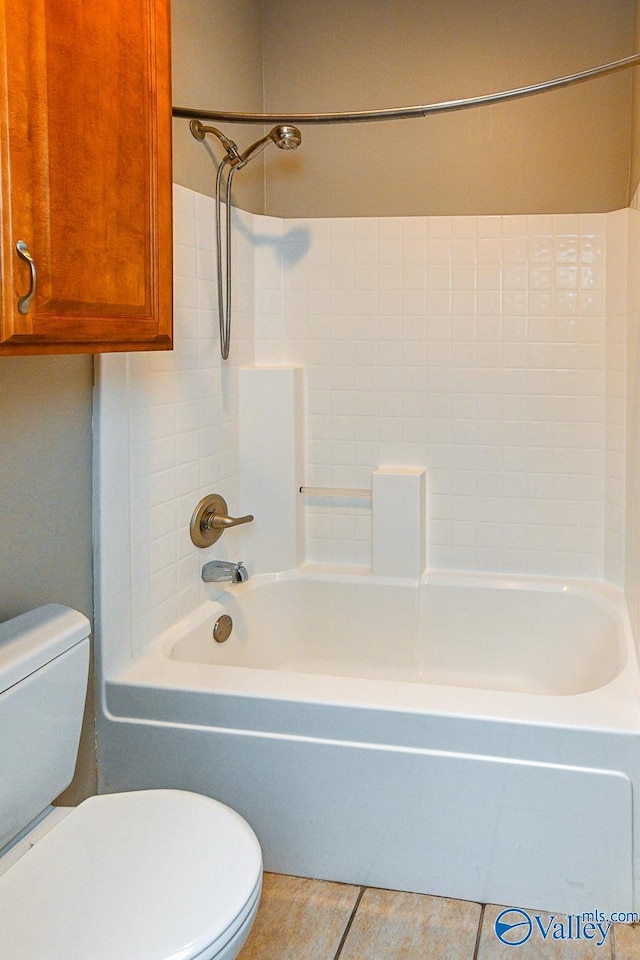 300 Honor Way, Madison, AL 35758 - bathroom featuring toilet, tile patterned flooring, and bathtub / shower combination