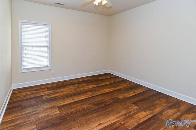 300 Honor Way, Madison, AL 35758 - spare room featuring a ceiling fan, dark wood finished floors, and baseboards