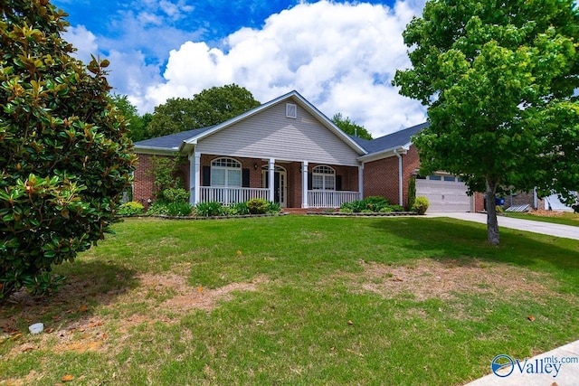 300 Honor Way, Madison, AL 35758 - view of front of property featuring a porch, brick siding, driveway, and a garage