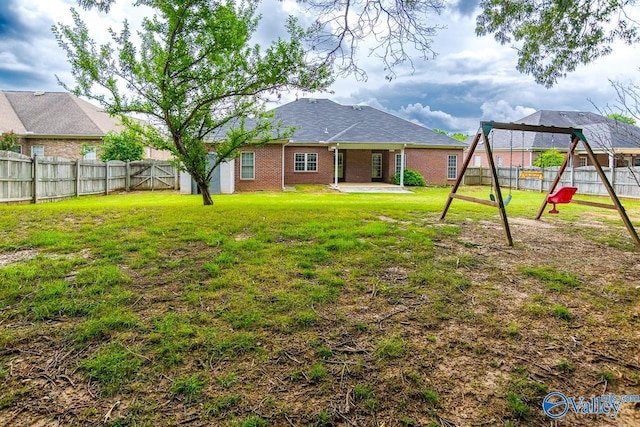 300 Honor Way, Madison, AL 35758 - view of yard featuring a playground and a patio area