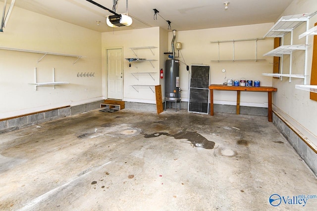 300 Honor Way, Madison, AL 35758 - garage featuring gas water heater, a garage door opener, and a workshop area