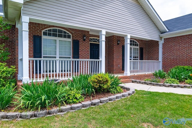 300 Honor Way, Madison, AL 35758 - property entrance with covered porch and brick siding