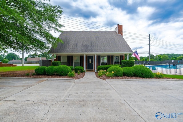 300 Honor Way, Madison, AL 35758 - cape cod house with a chimney