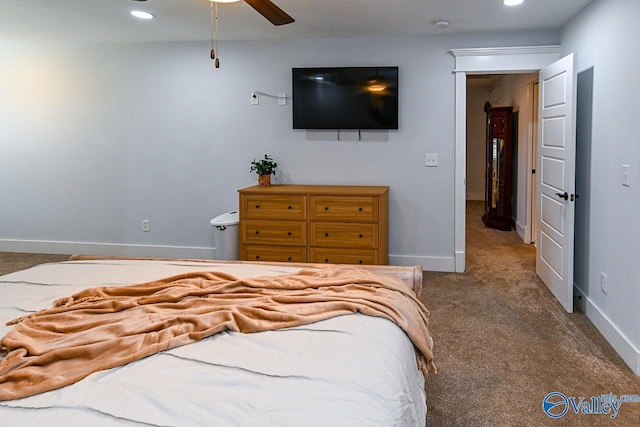 bedroom with ceiling fan and carpet floors