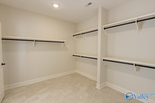 13888 Mallard Dr, Madison, AL 35756 - walk in closet featuring light floors