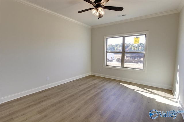 13888 Mallard Dr, Madison, AL 35756 - spare room with wood finished floors, crown molding, baseboards, and ceiling fan