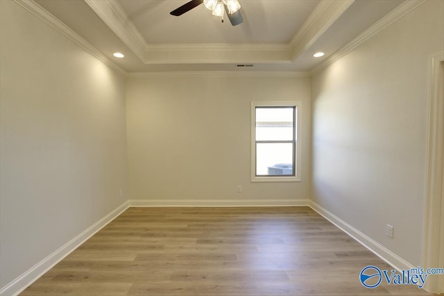 13888 Mallard Dr, Madison, AL 35756 - unfurnished room featuring a ceiling fan, light wood-style floors, a tray ceiling, recessed lighting, and baseboards